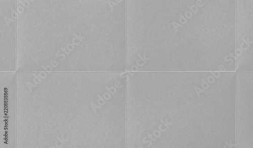 Black folded gritty paper texture with deep creases, distressed grain, rough noise, faded toner marks, and vintage monochrome grunge background.