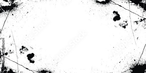 Black and white grunge texture with ink splatters, scratches, and distressed edges