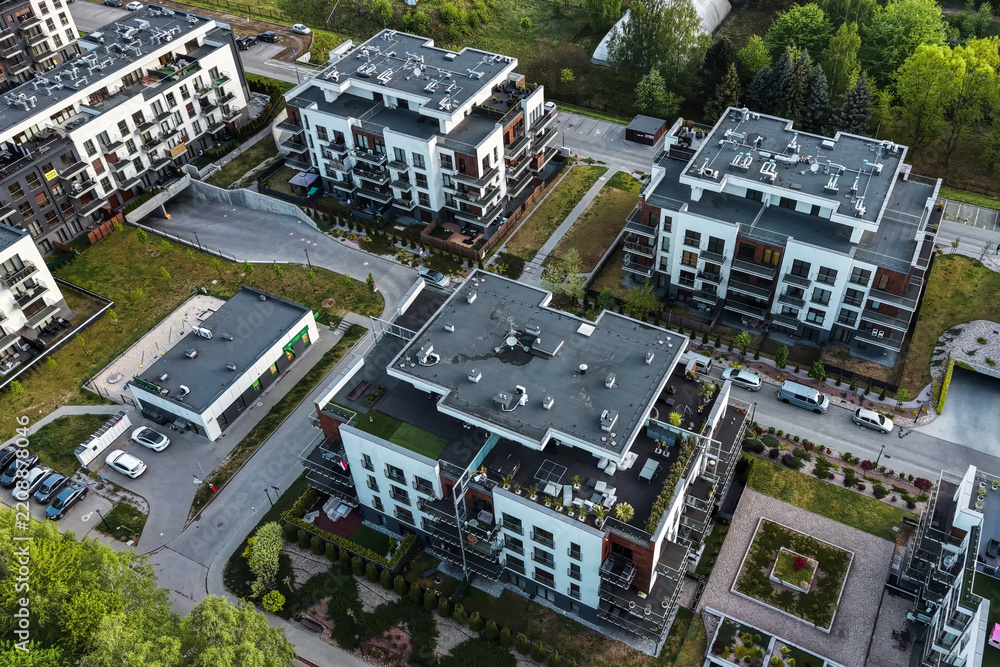 Fototapeta premium Apartment complex with balconies patios and garden areas
