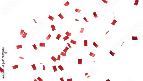 Scattered red confetti pieces falling, isolated on transparent background