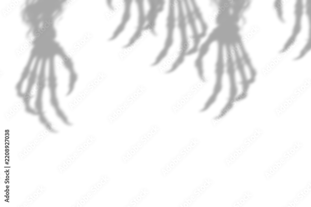 Fototapeta premium Spooky shadow of skeletal hands reaching down creating a halloween atmosphere isolated on transparent background