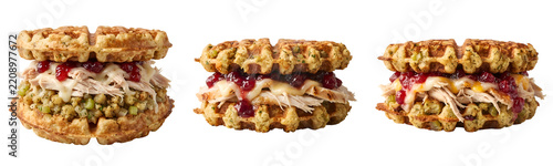 Thanksgiving savory stuffing waffle sandwiches filled with roasted turkey meat melted cheese and tart cranberry sauce presented in a isolated studio shot on transparent background