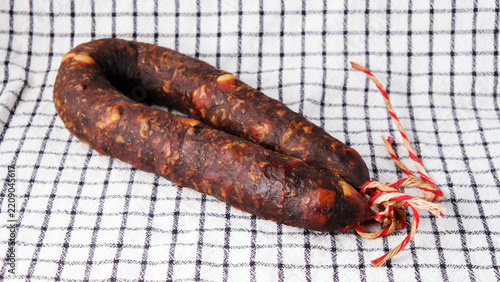 Gourmet cured meat delicacy in natural casing, perfect ingredient 