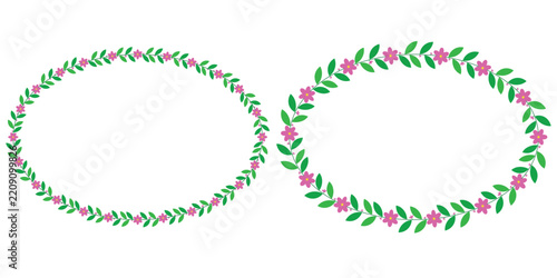 Two oval floral wreaths decorated with small pink flowers and green leaves