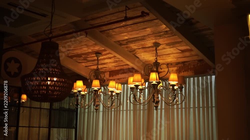 Vintage iron hanging chandelier with wooden interior, India