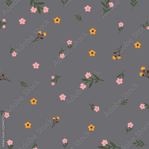 Small wildflowers and foliage pattern on a dark gray background seamless repeat