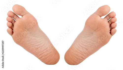 Two bare human feet soles facing outwards, isolated on transparent background