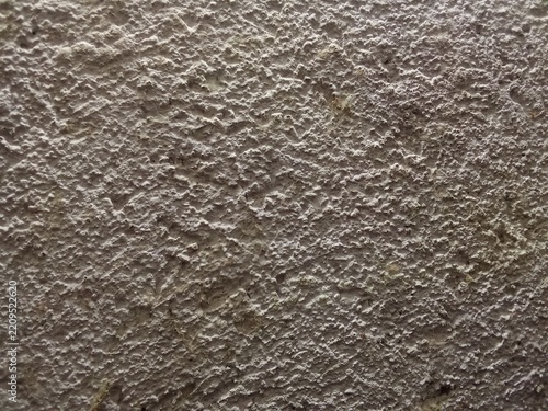 Detailed view of a coarse grey concrete surface with concrete texture rough surface grey wall cement background coarse material stone texture weathered surface construction