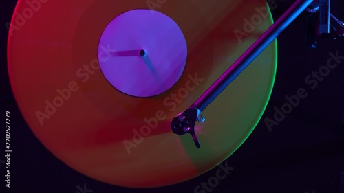 Close-up of a vinyl record playing on a turntable