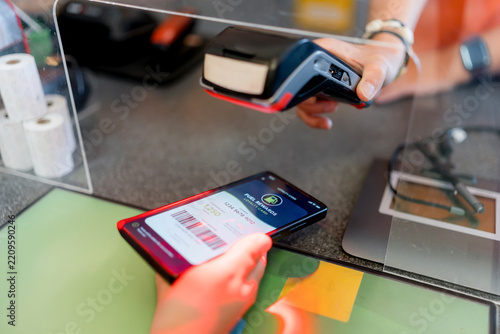 Contactless smartphone payment for fuel purchase at gas station