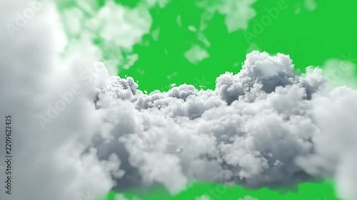 Fluffy white clouds flying in green screen background video motion clip simulating aerial flight through atmosphere