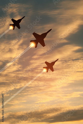 Air Force Day. Aircraft silhouettes on background of sunset. Combat flight of interceptors on a mission. Vertical poster.