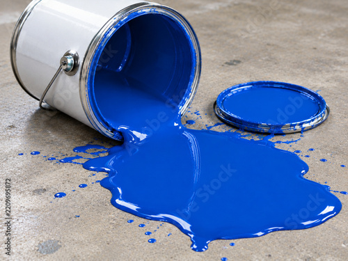 A spilled bucket of blue paint