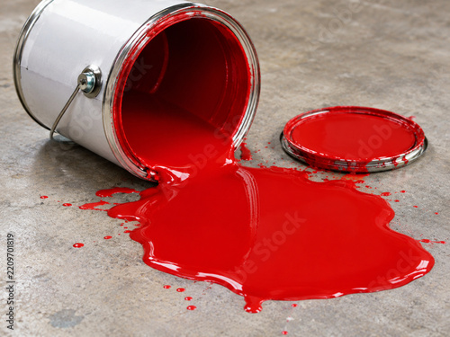 A spilled bucket of red paint