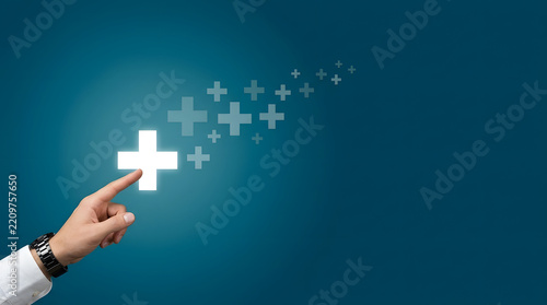 Businessman hand touching a glowing plus sign icon representing positive growth, medical health care, financial success, and adding value to business or personal development on blue background.