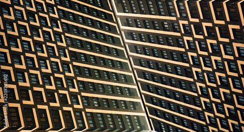 Abstract architectural pattern of modern skyscraper facade with geometric windows