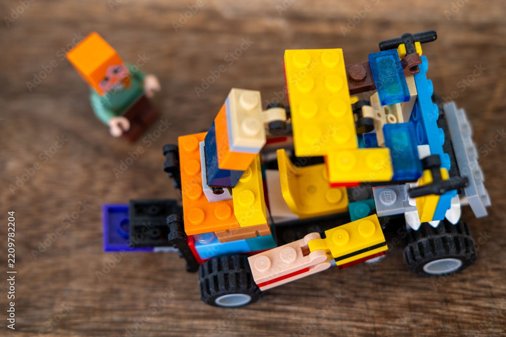 Obraz premium transformer car LEGO bricks plastic blocks toys, Gaming culture and block building hobby, Creative Educational toy game merchandise children play, children's playroom, Childhood play and creativity