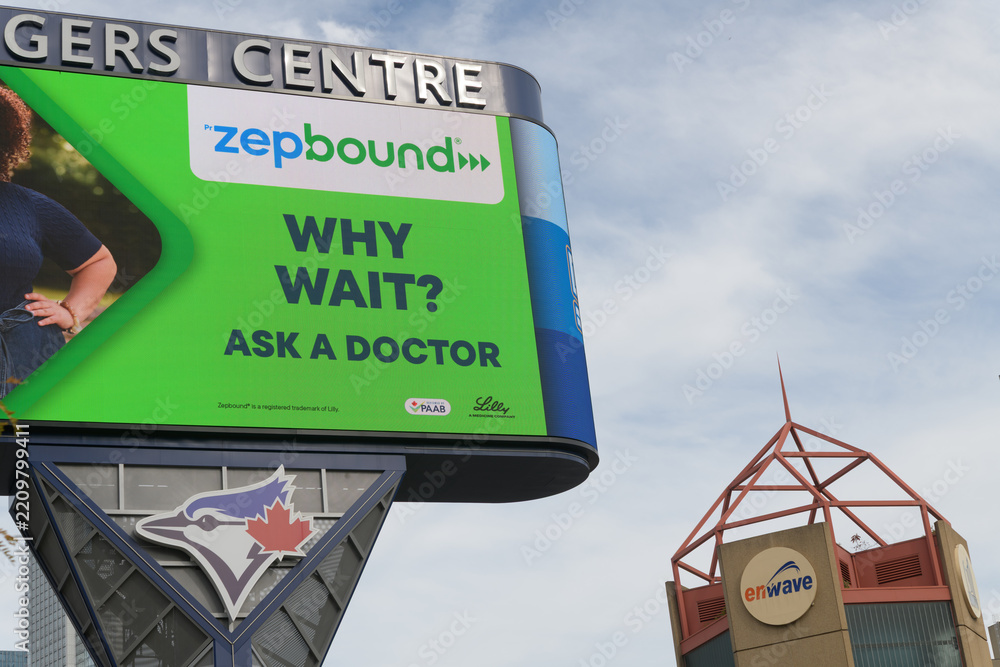 Fototapeta premium Rogers Centre Gardiner Pylon (or the Rogers Centre Pylon Marquee) with advertising for Zepbound (tirzepatide), Toronto