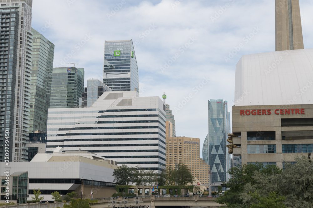 Fototapeta premium looking east from the Spadina Av bridge over Union Station Rail Corridor to Roger Centre, hotel, convention center, and buildings in the financial district, Toronto