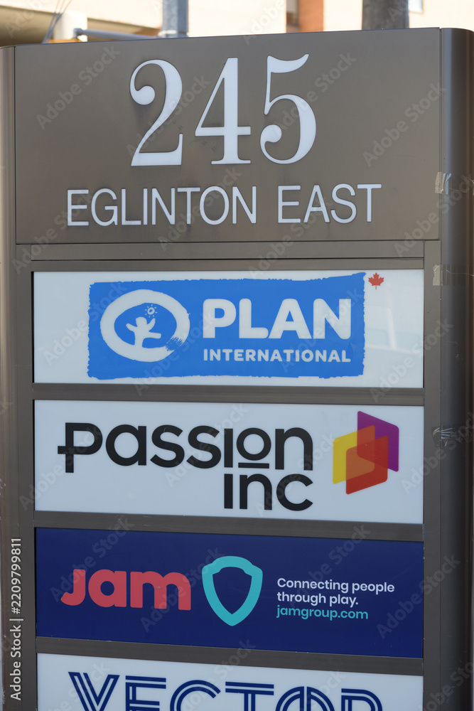 Obraz premium free-standing pylon sign / directory monolith located at 245 Eglinton Avenue East (Plan International, JAM Group (JAM Sports), and Vector), Toronto