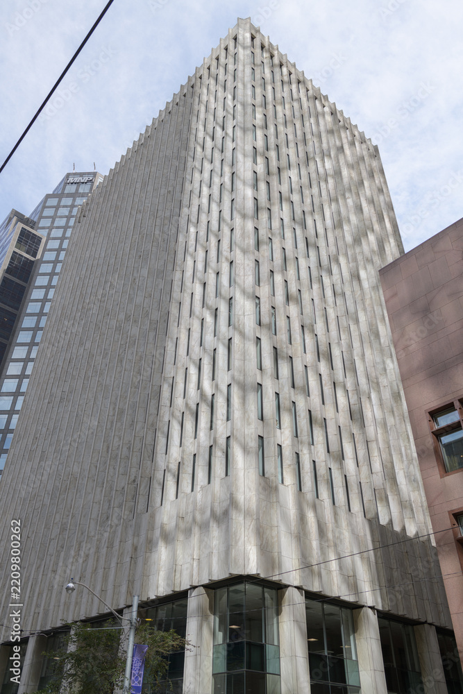 Fototapeta premium exterior of Canada Trust Building, designed by Crang & Boake, 1968, located at 110 Yonge St, Toronto