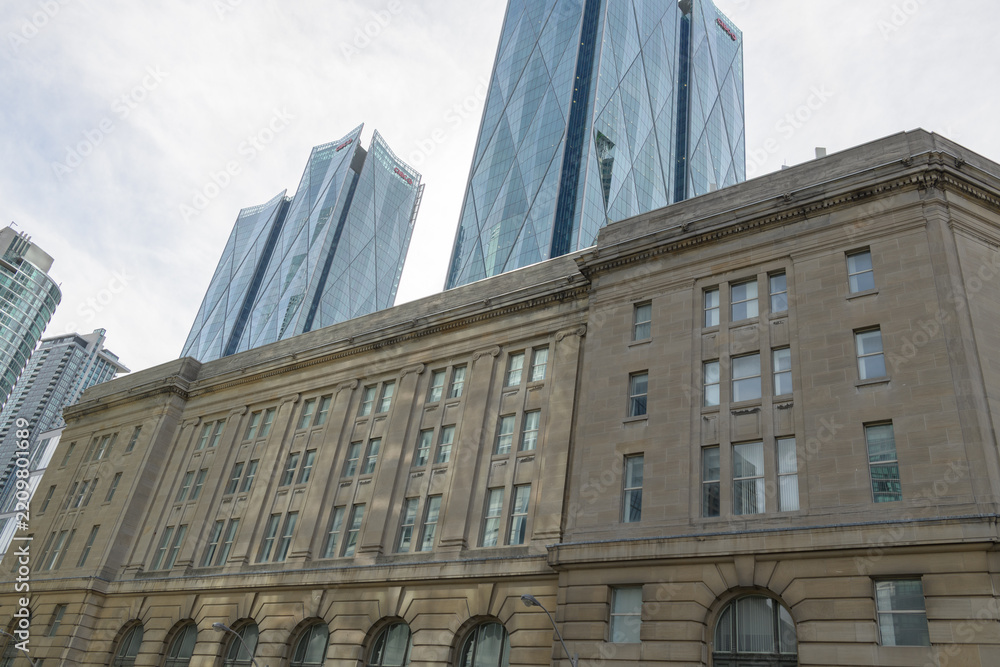 Obraz premium east elevation of historic Dominion Public Building and the south and north towers of CIBC Square, viewed from Yonge St, Toronto