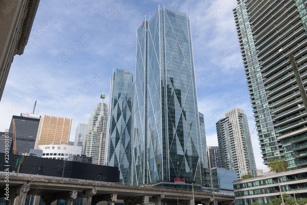 Fototapeta premium southwest elevation of CIBC Square, designed by WilkinsonEyre and Adamson Associates, located at 81 and 141 Bay St, Toronto