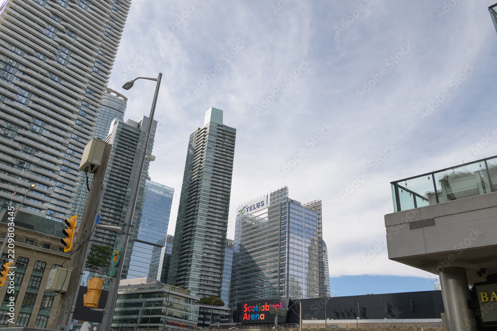 Fototapeta premium distant view of TELUS Harbour, a corporate office building, located at 25 York St, viewed looking northwest from Harbour St and Bay St, Toronto