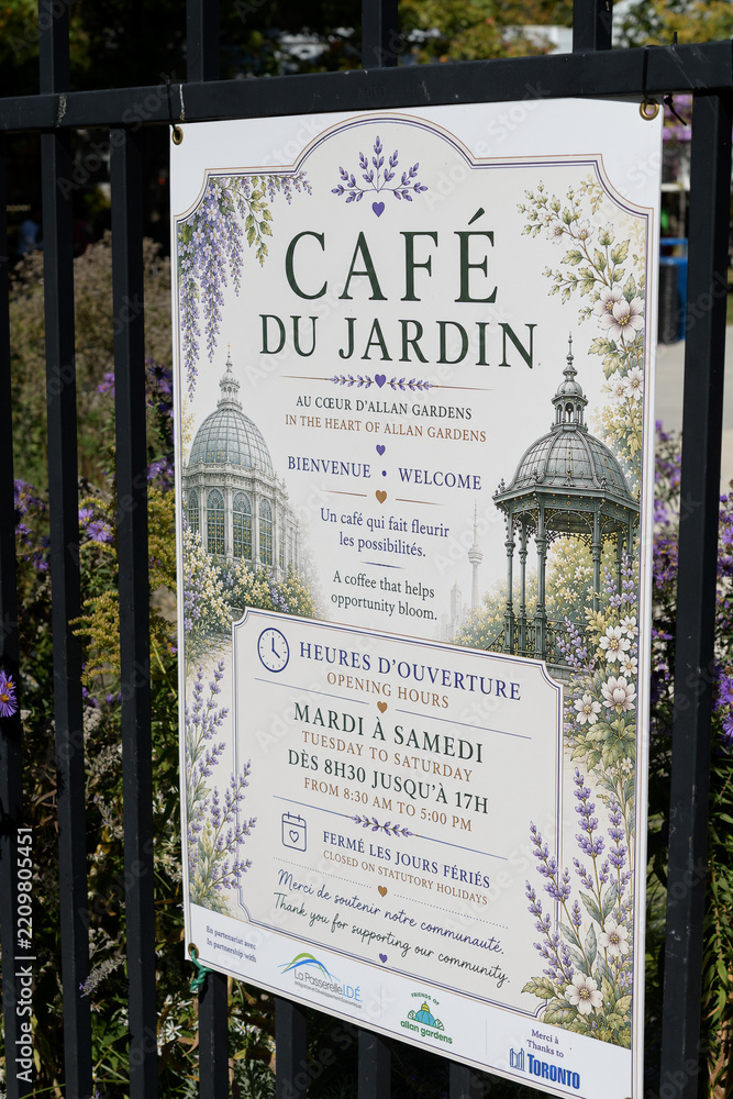 Fototapeta premium sign at Café du Jardin located at 19 Horticultural Av, Allan Gardens, Toronto