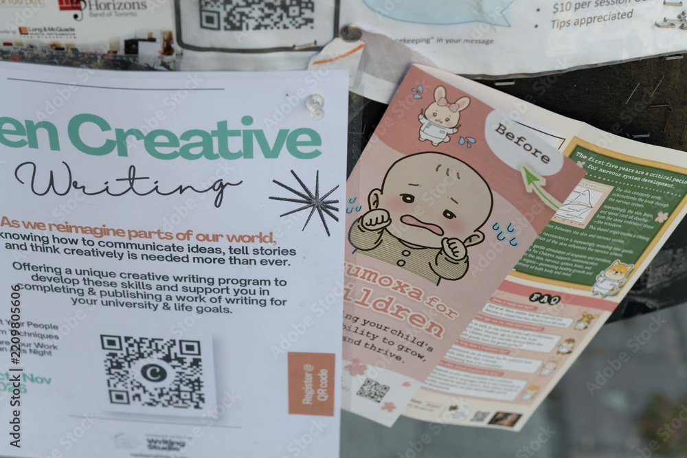 Fototapeta premium street posters and pamphlets on a community message board in Toronto (Creative Writing, child development)