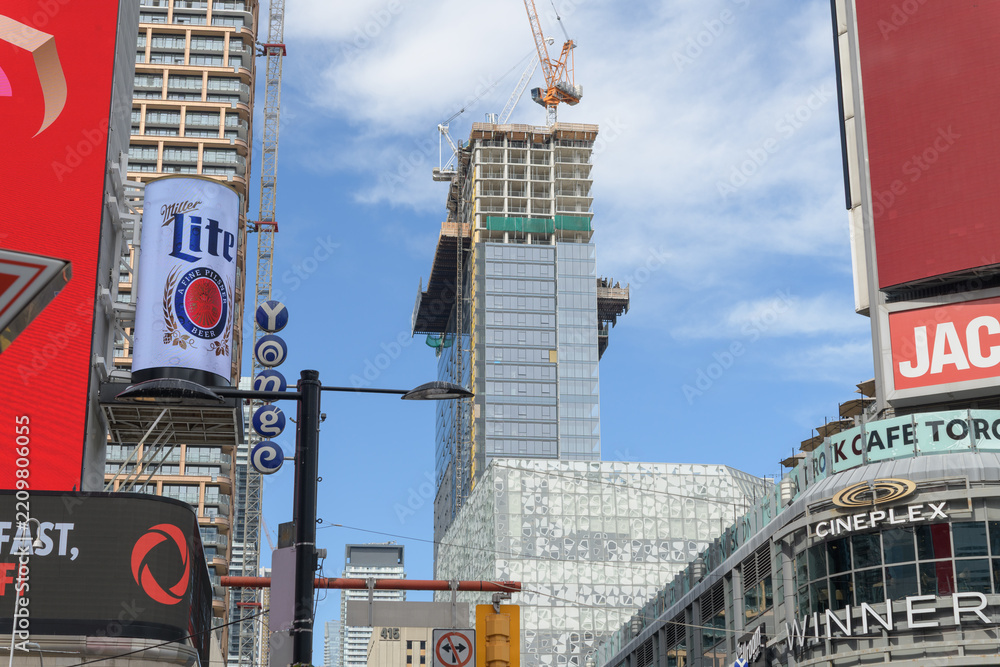 Fototapeta premium (at center) construction of Concord Sky Condo at 391 Yonge St, viewed looking north on Yonge St just south of Sankofa Square, Toronto