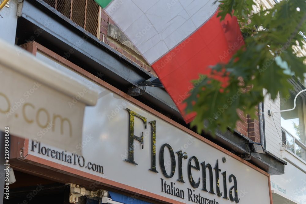 Fototapeta premium signage over entrance to Florentia, an Italian restaurant, located at 570 Mount Pleasant Rd, Toronto