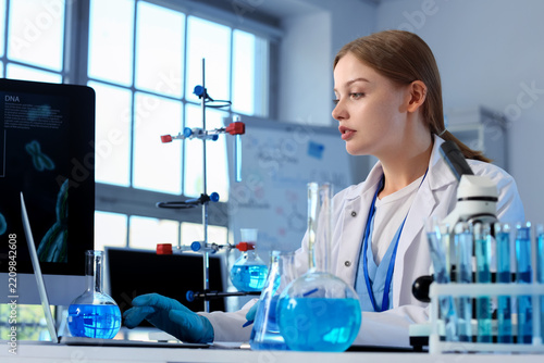 Biotechnology research and genetic engineering, scientist working on dna anal...