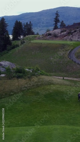 4K drone aerial golf course ridge mountain landscape