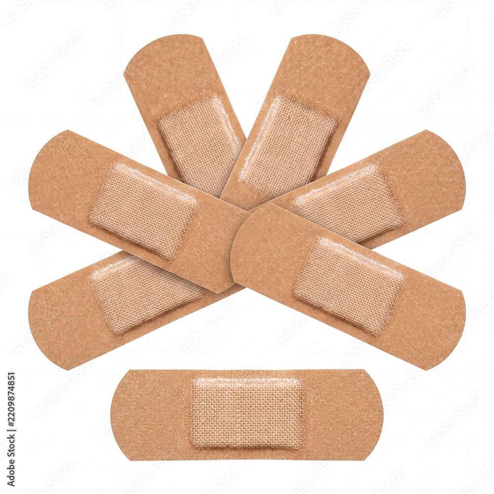 Obraz premium Collection of several brown flexible fabric adhesive bandages and medical plasters for wound care and first aid treatment, isolated on a white background, representing safety and healthcare supplies.