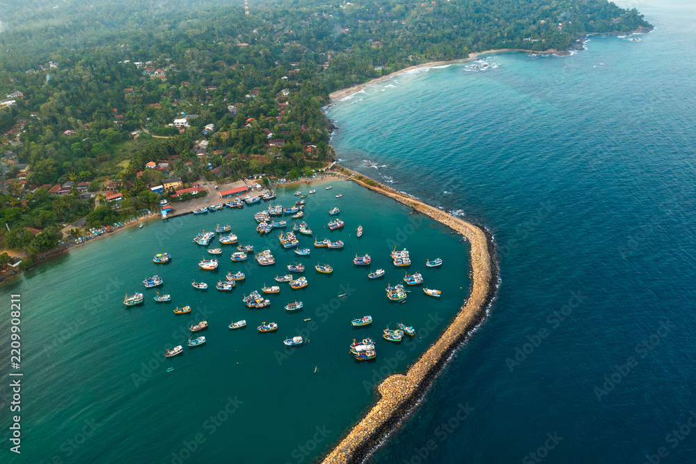 Fototapeta premium Fishing Boats Anchored in Nilwella Fishery Harbour Overhead View