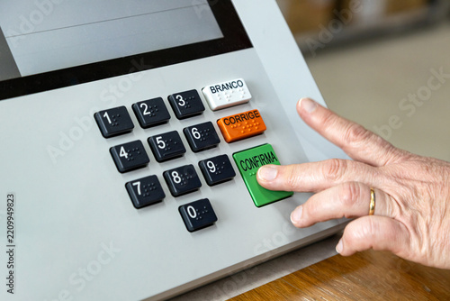 Close-up of a voter voting on electronic voting machine ahead of Brazilian elections