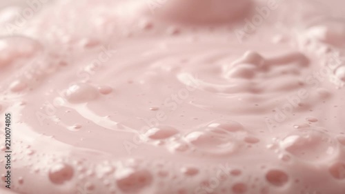 Soft Pink Cream Texture with Bubbles Representing Skincare, Cosmetics, and Beauty Products