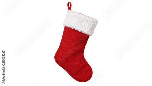 Red knitted Christmas stocking with white fluffy trim, isolated on transparent background