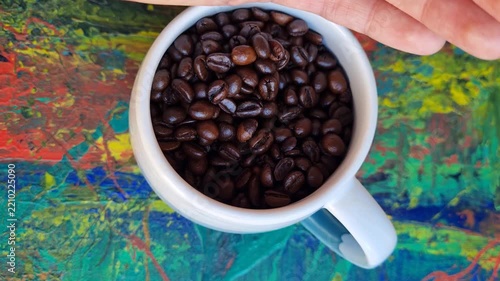 Coffee beans on colorful background. 