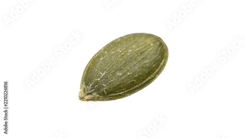 Single raw green pumpkin seed organic pepita superfood isolated on transparent background