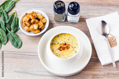 Traditional Turkish winter spinach soup, presented with croutons.