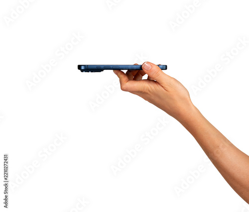 Female hand holding smartphone up to scan a QR code or make a contactless payment