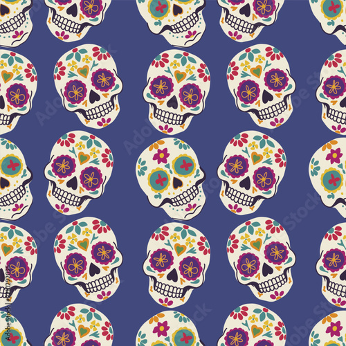 Colorful Mexican Day of the Dead vector seamless pattern with sugar skulls and marigold.