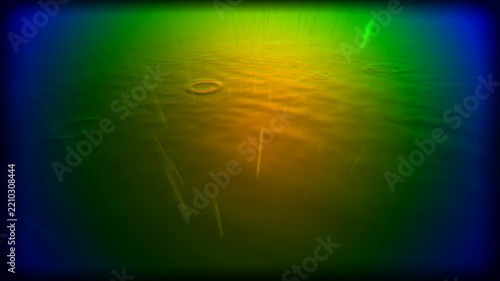 Abstract Raindrops on Water Surface with Colorful Light Reflections