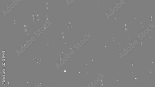 Rain drops falling behind creating wet weather atmosphere. Rain over black background, realistic rain can be use in your composition. 4k