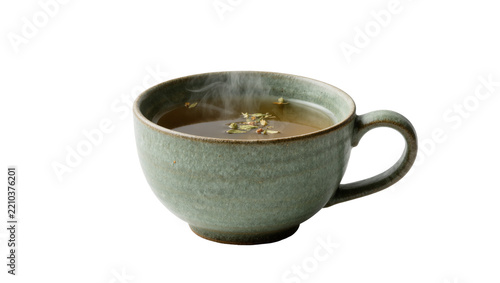 Steaming herbal tea in a rustic green ceramic mug, isolated on transparent background