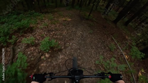 POV Video Of Mountain Biker Riding Fast On Dark Enduro Forest Trail