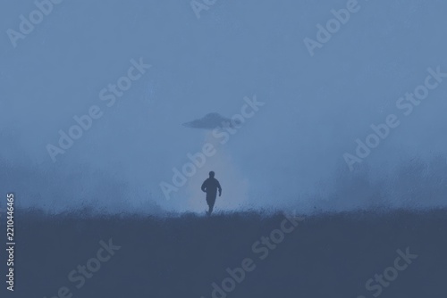 A man walking through a foggy field with a ufo hovering above him. the sky is visible in the background and there is text at the bottom of the .