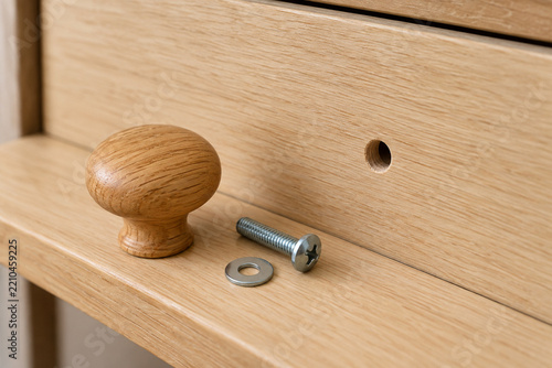 Cabinet knob hardware arranged for secure refitting